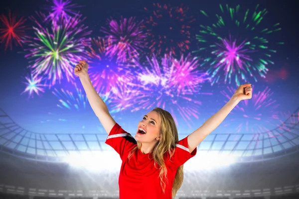 Cheering football fan in red — Stock Photo, Image