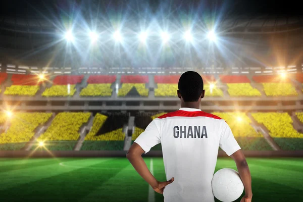 Ghana football player holding ball — Stock Photo, Image