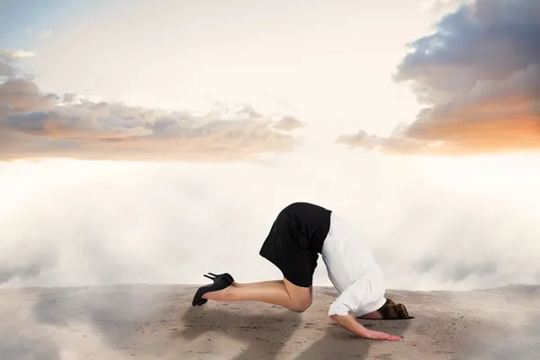 Businesswoman burying her head — Stock Photo, Image