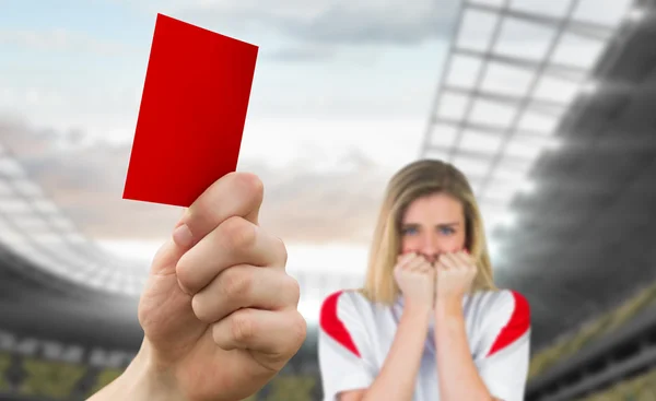 Mano sosteniendo la tarjeta roja para abanico —  Fotos de Stock