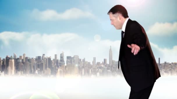Businessman walking across tightrope — Stock Video