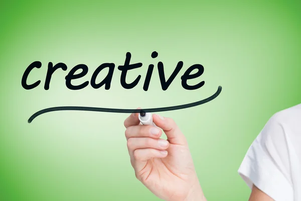 Empresaria escribiendo palabra creativa —  Fotos de Stock