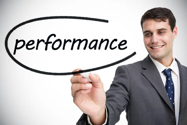 Businessman writing word performance — Stock Photo, Image