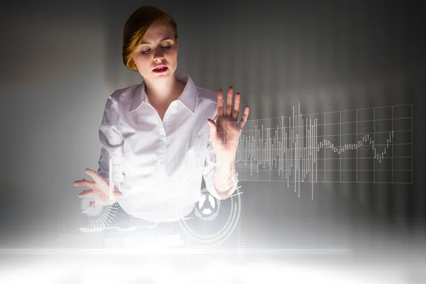 Businesswoman using interactive desk — Stock Photo, Image