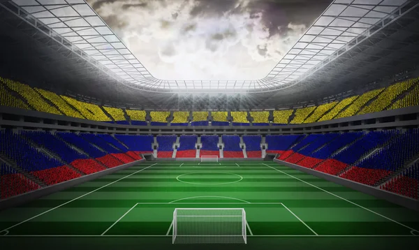 Colombia flaggan mot fotbollsstadion — Stockfoto