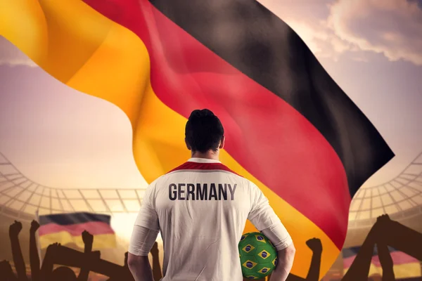 Germany football player holding ball — Stock Photo, Image