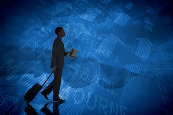 Businessman pulling his suitcase — Stock Photo, Image