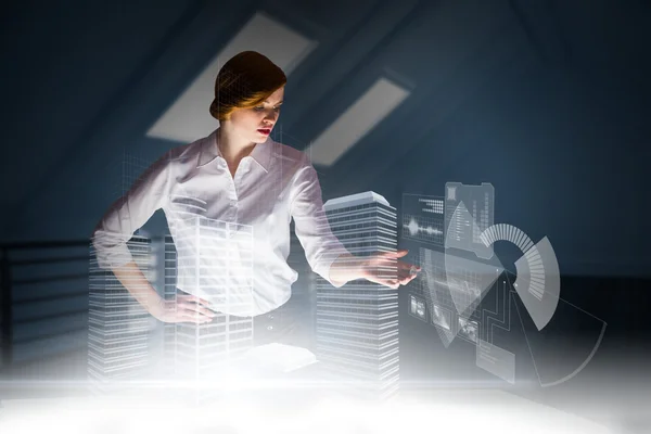 Businesswoman using interactive desk — Stock Photo, Image