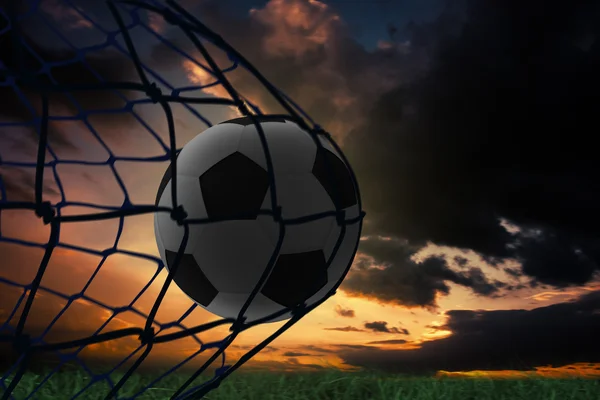 Football in back of the net — Stock Photo, Image