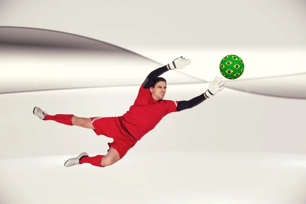 Fit goal keeper jumping up — Stock Photo, Image