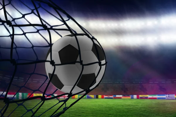 Football in back of the net — Stock Photo, Image