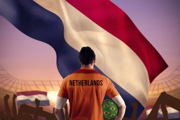 Netherlands football player holding ball — Stock Photo, Image