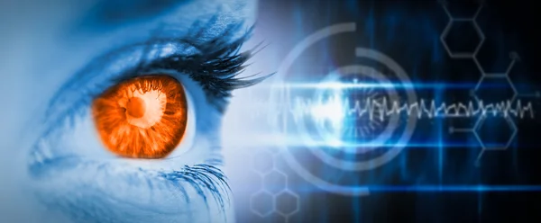 Orange eye on blue face — Stock Photo, Image