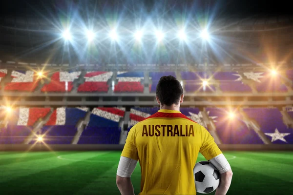 Australië voetbal speler bedrijf bal — Stockfoto