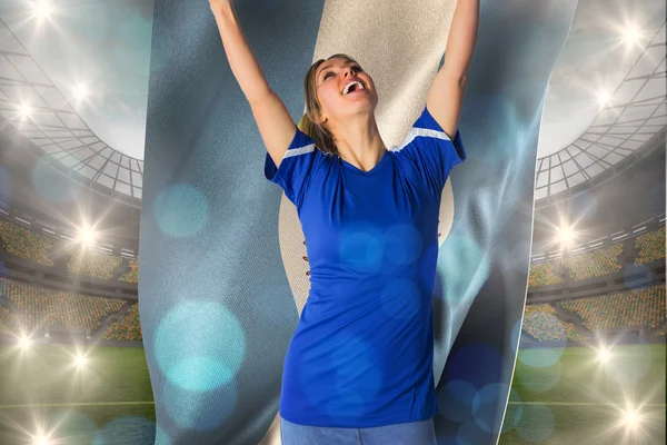 Football fan holding argentina flag — Stock Photo, Image