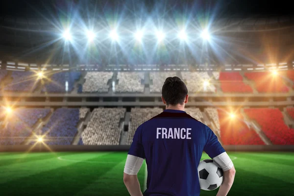 France football player holding ball — Stock Photo, Image