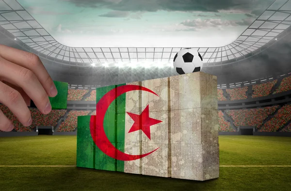 Hand building wall of algeria flag — Stock Photo, Image