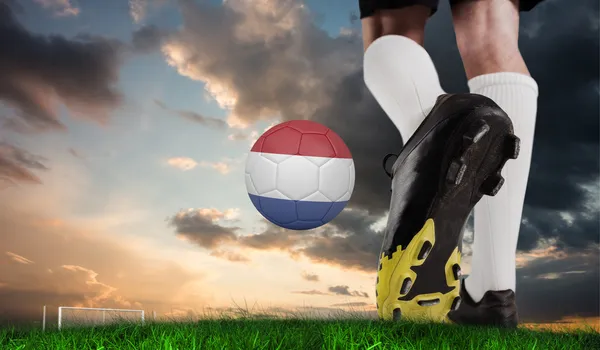 Football boot kicking dutch ball — Stock Photo, Image