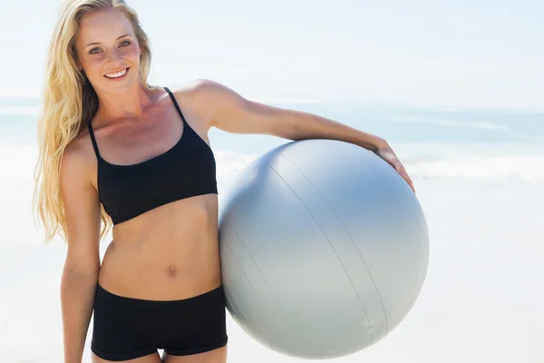 Blonde holding exercise ball — Stock Photo, Image