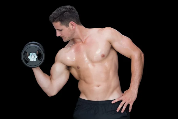 Strong crossfitter lifting up dumbbell — Stock Photo, Image