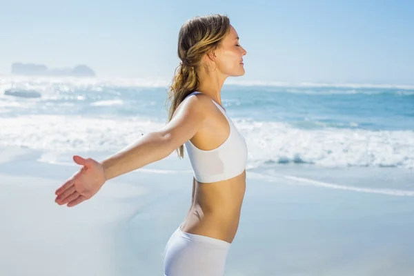 Blonde standing with arms out — Stock Photo, Image