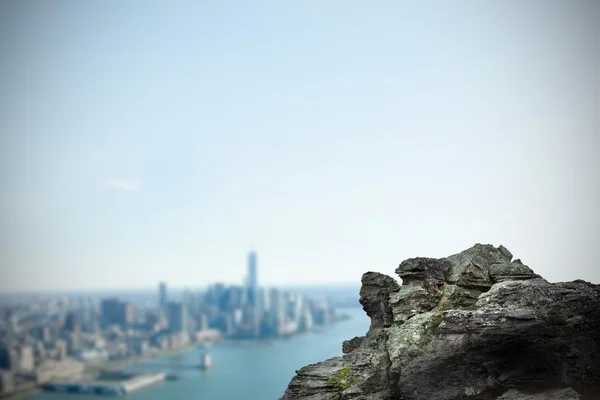 Rock overlooking coastline city — Stock Photo, Image