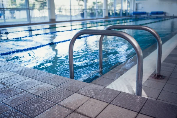 Swimming pool with hand rails — Stock Photo, Image