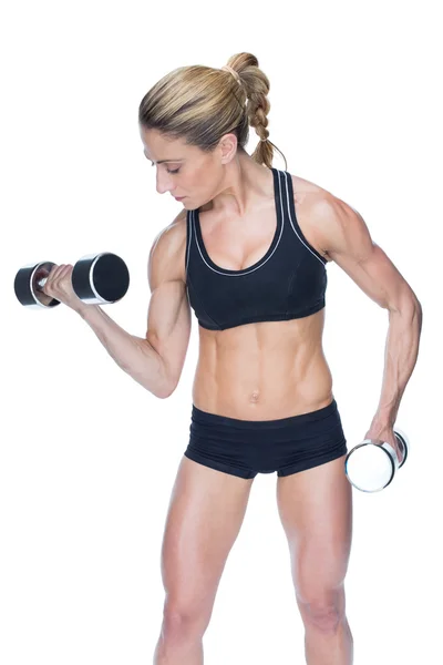 Bodybuilder working out with dumbbells — Stock Photo, Image