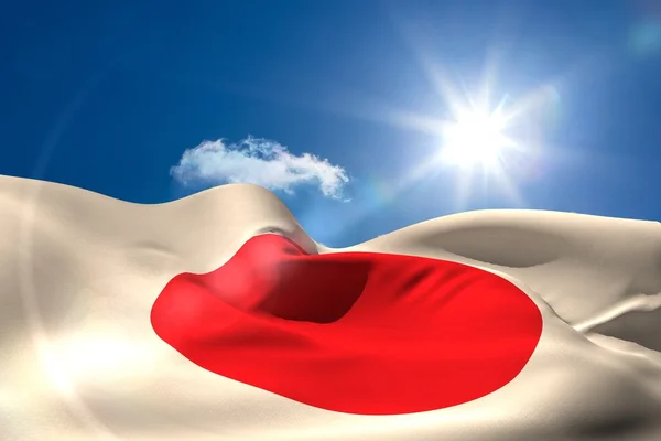 Японский национальный флаг под солнцем — стоковое фото