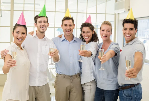 Business team celebrating with champagne — Stock Photo, Image