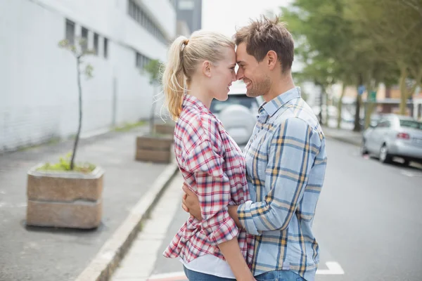 Couple in denim hugging each other — Stock Photo, Image