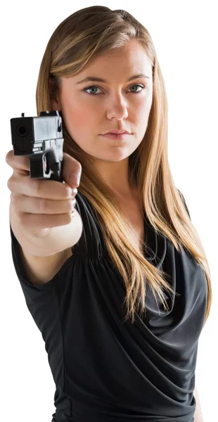 Femme fatale pekar pistol — Stockfoto