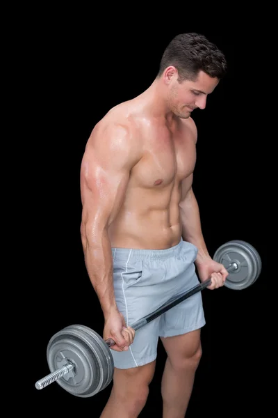 Strong crossfitter lifting up dumbbell — Stock Photo, Image