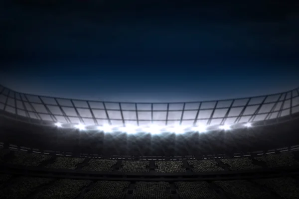 Grande estádio de futebol sob céu noturno — Fotografia de Stock