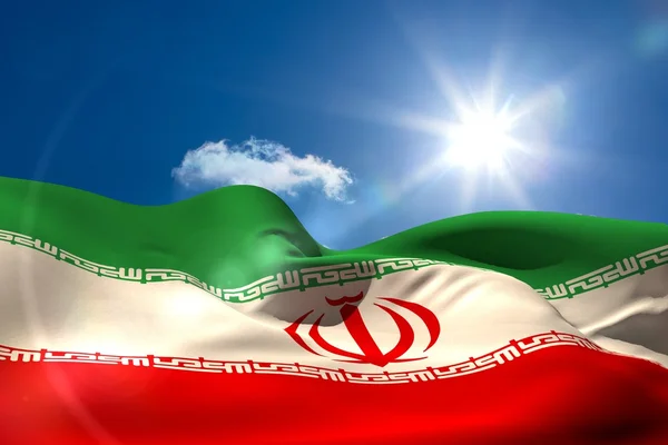 Iran national flag under sunny sky — Stock Photo, Image