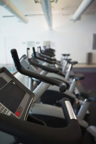 Row of cross trainer machines — Stock Photo, Image