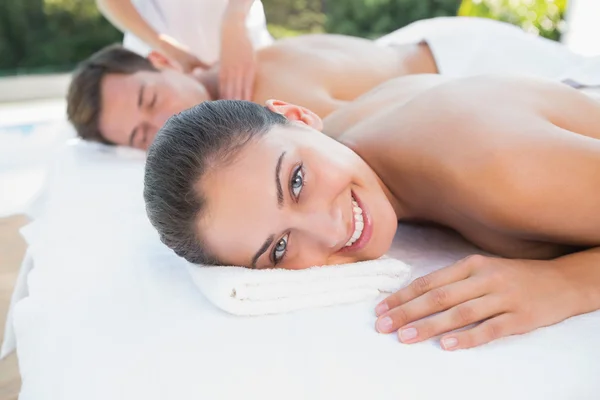 Couple enjoying couples massage — Stock Photo, Image