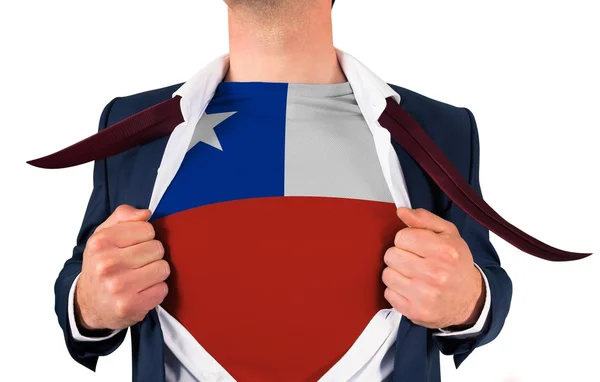 Businessman opening shirt to reveal chile flag — Stock Photo, Image