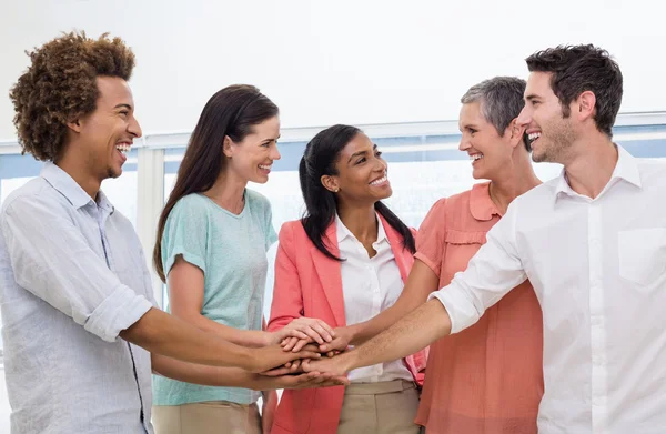 Business team putting hands together — Stock Photo, Image