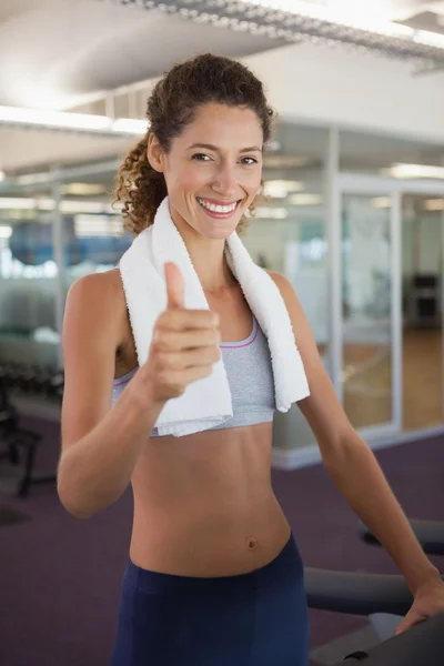 Ajuste mujer mostrando pulgares hacia arriba — Foto de Stock