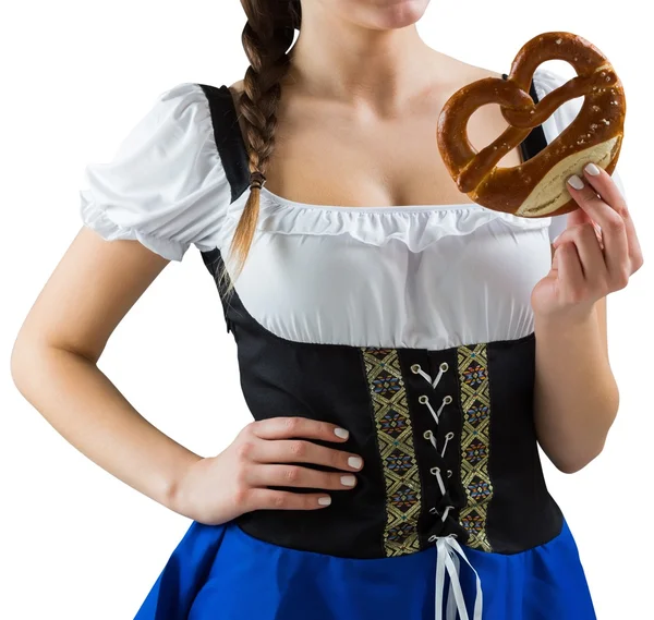 Pretty oktoberfest girl holding pretzel — Stock Photo, Image