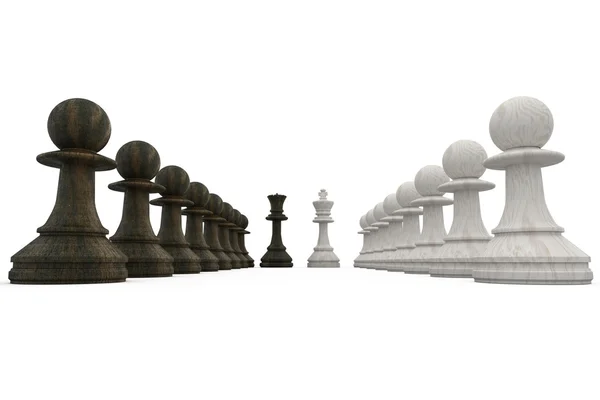 Wooden chess pieces facing off — Stock Photo, Image