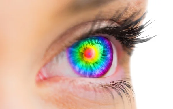 Psychedelic eye looking ahead on female face — Stock Photo, Image