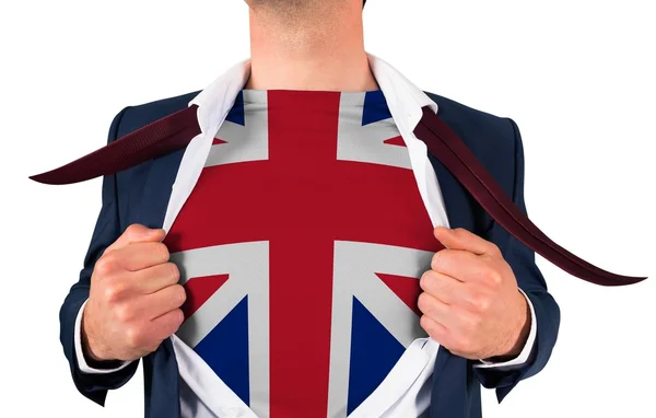 Businessman opening shirt to reveal union jack flag — Stock Photo, Image