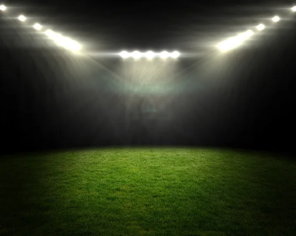 Football pitch under bright spotlights — Stock Photo, Image