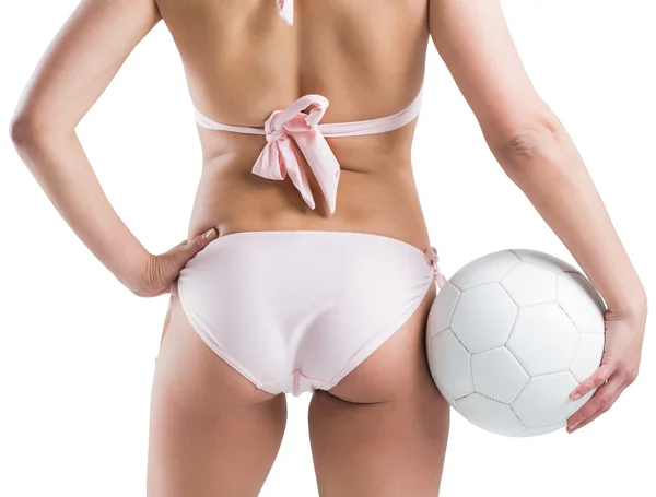 Chica en bikini sosteniendo el fútbol — Foto de Stock