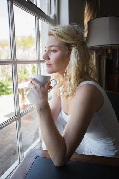 Blonde having coffee — Stock Photo, Image
