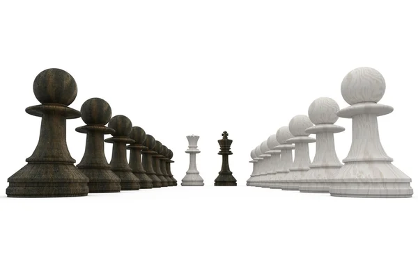 Wooden chess pieces facing off — Stock Photo, Image