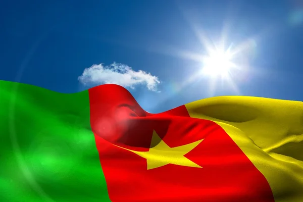 Cameroon national flag under sunny sky — Stock Photo, Image