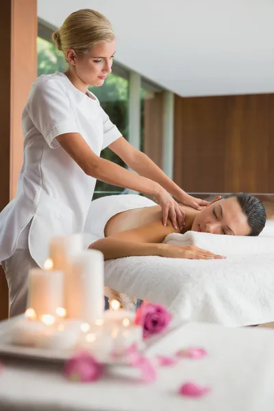 Brunette getting a shoulder massage — Stock Photo, Image